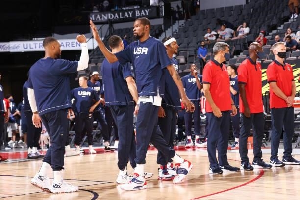 Kevin Durant of the USA Men's National Team high fives Damian Lillard of the USA Men's National Team before the game against the Nigeria Men's...