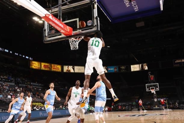 Chimezie Metu of the Nigeria Men's National Team dunks the ball during the game against the Argentina Men's National Team on July 12, 2021 at...