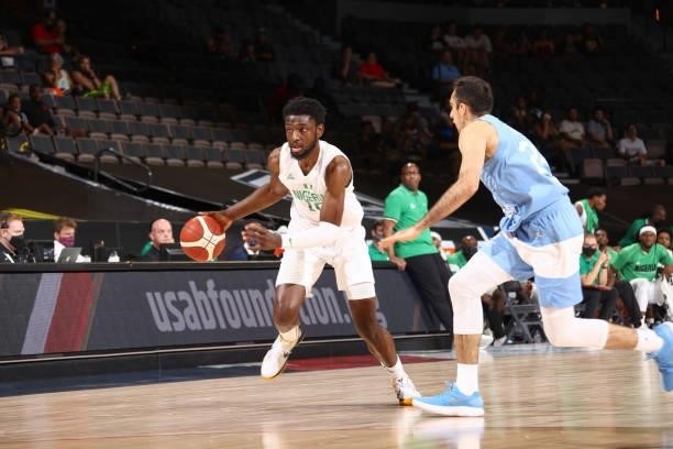 Chimezie Metu of the Nigeria Men's National Team handles the ball during the game against the Argentina Men's National Team on July 12, 2021 at...