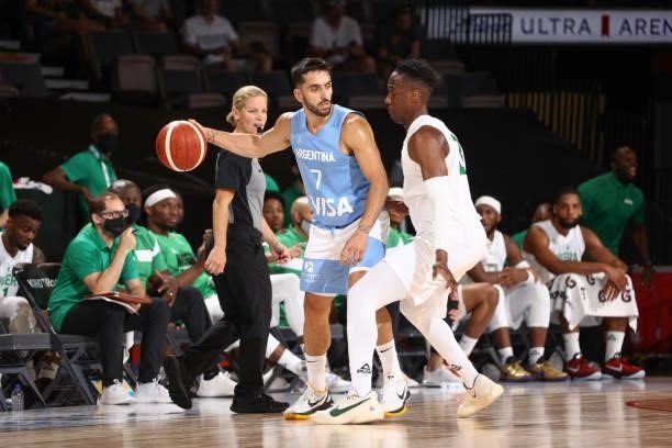 Facundo Campazzo of the Argentina Men's National Team handles the ball as Miye Oni of the Nigeria Men's National Team plays defense on July 12, 2021...