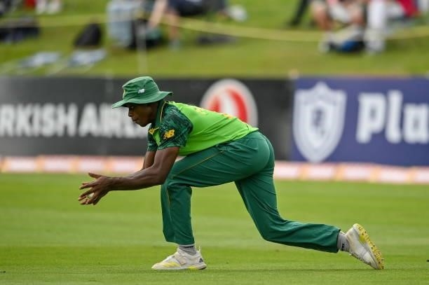 Dublin , Ireland - 13 July 2021; Kagiso Rabada of South Africa catches Ireland's Harry Tector during the 2nd Dafanews Cup Series One Day...