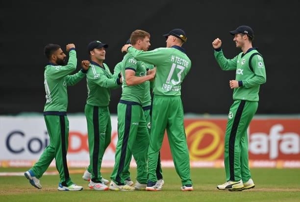 Dublin , Ireland - 13 July 2021; Craig Young of Ireland, centre, is congratulated by team-mates after claiming the wicket of South Africa's Aiden...