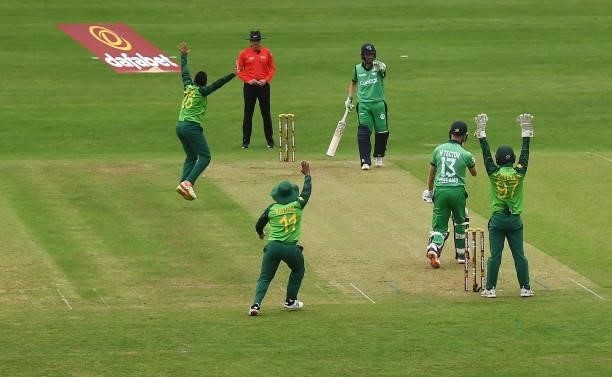 Dublin , Ireland - 13 July 2021; South Africa players protest a wicket during the 2nd Dafanews Cup Series One Day International match between Ireland...