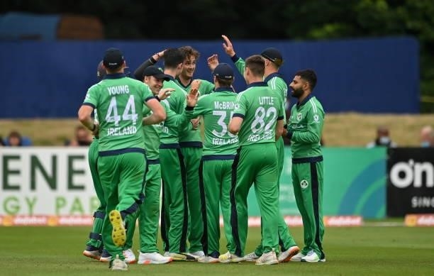 Dublin , Ireland - 13 July 2021; Mark Adair of Ireland is congratulated by team-mates after catching South Africa's Janneman Malan during the 2nd...