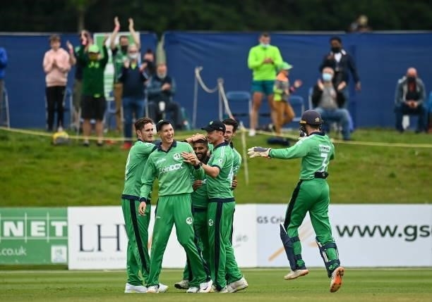 Dublin , Ireland - 13 July 2021; Ireland players celebrate the wicket of David Miller of South Africa during the 2nd Dafanews Cup Series One Day...