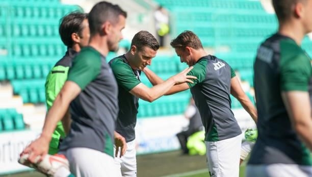 Hibernian players pre match warm up at Easter Road on July 13, 2021 in Edinburgh, Scotland.