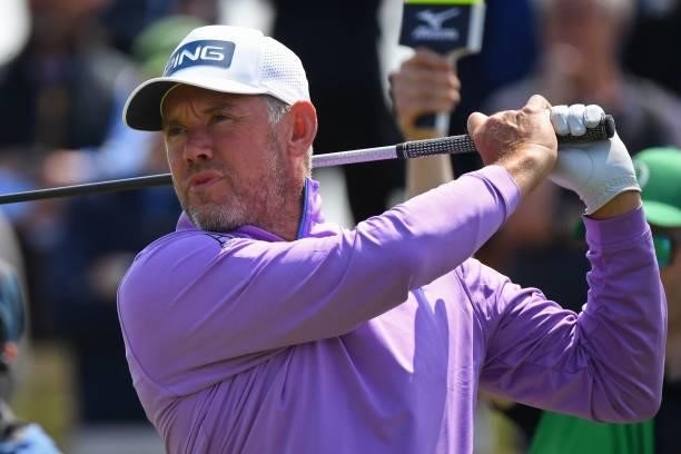 England's Lee Westwood watches his drive from the 7th tee during a practice round for The 149th British Open Golf Championship at Royal St George's,...