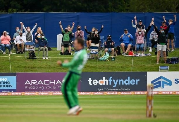 Dublin , Ireland - 13 July 2021; Spectators celebrate during the 2nd Dafanews Cup Series One Day International match between Ireland and South Africa...