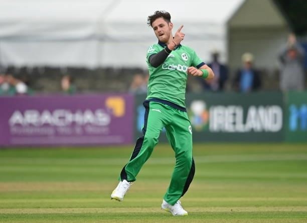 Dublin , Ireland - 13 July 2021; Mark Adair of Ireland celebrates claiming the final wicket and his side's victory during the 2nd Dafanews Cup Series...