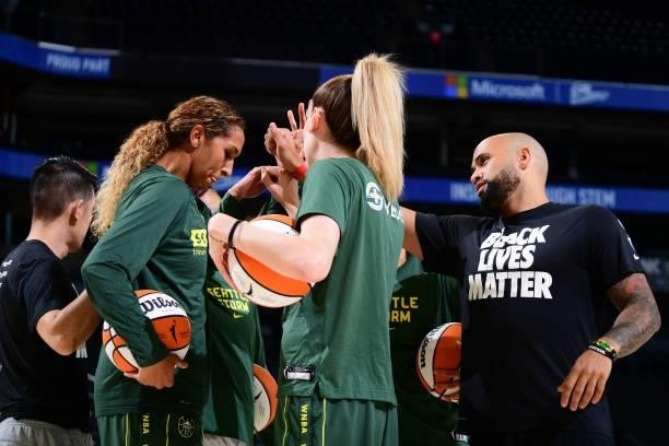 The Seattle Storm huddle before the game against the Phoenix Mercury on July 9, 2021 at Phoenix Suns Arena in Phoenix, Arizona. NOTE TO USER: User...