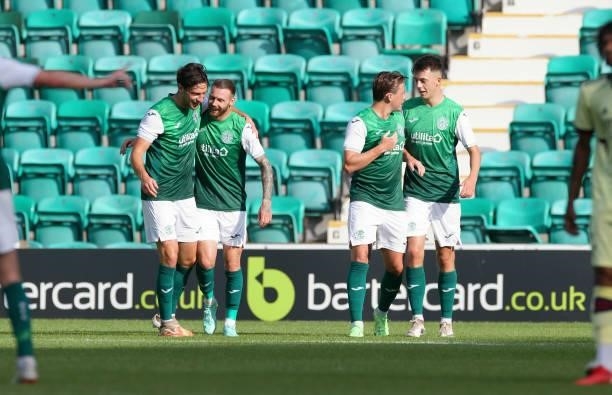 Martin Boyle of Hibernian celebrates his goal with teammates during the pre season friendly between Hibernian and Arsenal at Easter Road on July 13,...
