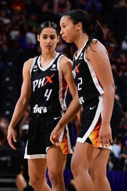 Skylar Diggins-Smith talks with Megan Walker of the Phoenix Mercury during the game against the Seattle Storm on July 9, 2021 at Phoenix Suns Arena...