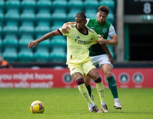 Hibernian's Lewis Stevenson in action with Reiss Nelson of Arsenal during a pre-season friendly between Hibernian and Arsenal at Easter Road, on July...