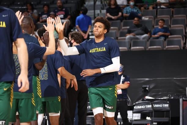 Matisse Thybulle of the Australia Men's National Team high fives teammates before the game against the Nigeria Men's National Team on July 13, 2021...