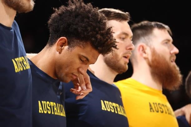 Matisse Thybulle of the Australia Men's National Team listens to the national anthem before the game against the Nigeria Men's National Team on July...