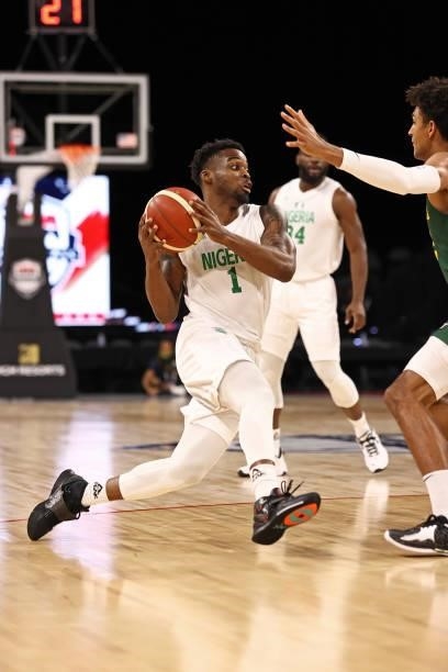 Ike Iroegbu of the Nigeria Men's National Team drives to the basket against the Australia Men's National Team on July 13, 2021 Michelob ULTRA Arena...