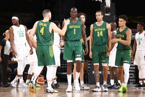 Chris Goulding of the Australia Men's National Team high fives teammates during the game against the Nigeria Men's National Team on July 13, 2021 at...