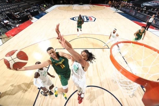 Dante Exum of the Australia Men's National Team drives to the basket against the Nigeria Men's National Team on July 13, 2021 at Michelob ULTRA Arena...