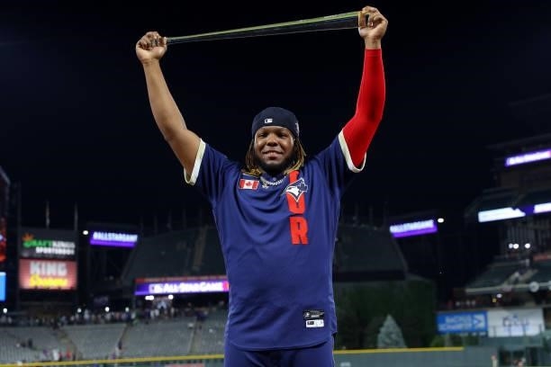 Vladimir Guerrero Jr. #27 of the Toronto Blue Jays poses with the Ted Williams All-Star Game MVP trophy after the American League defeated the...