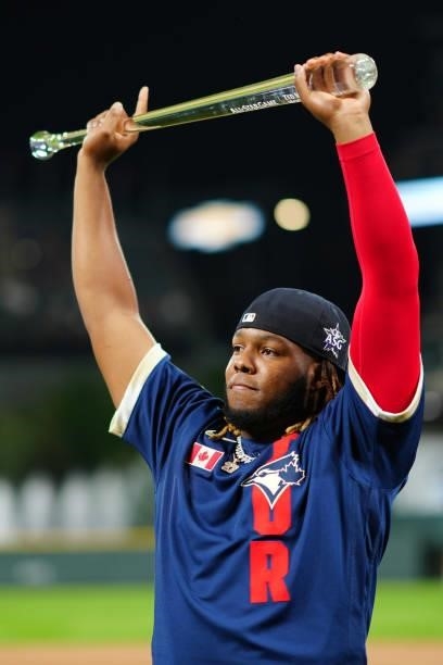 Vladimir Guerrero Jr. #27 of the Toronto Blue Jays poses with the Ted Williams All-Star MVP Award trophy presented by Chevrolet after the American...