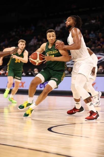 Dante Exum of the Australia Men's National Team drives to the basket against the Nigeria Men's National Team on July 13, 2021 Michelob ULTRA Arena in...