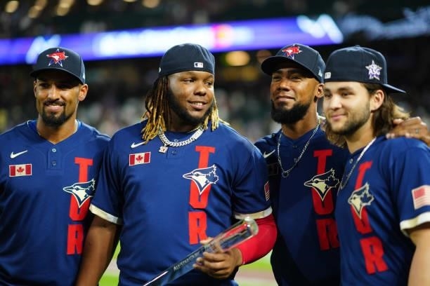 Vladimir Guerrero Jr. #27 of the Toronto Blue Jays poses with the Ted Williams All-Star MVP Award trophy presented by Chevrolet and Toronto Blue Jays...