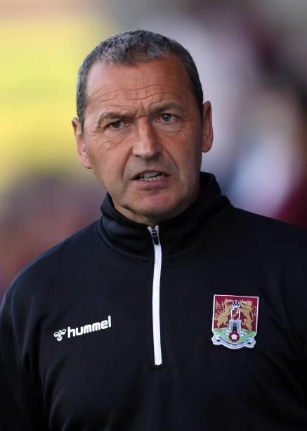 Northampton Town assistant manager Colin Calderwood during the Pre-season friendly between Northampton Town and West Ham United at Sixfields on July...