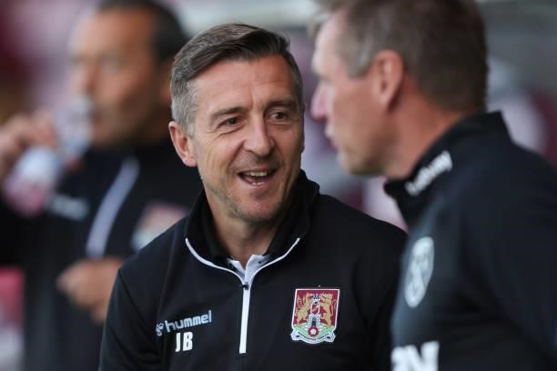 Jon Brady Northampton Town manager during the Pre-season friendly between Northampton Town and West Ham United at Sixfields on July 13, 2021 in...