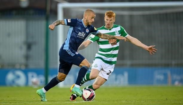Dublin , Ireland - 13 July 2021; Vladimír Weiss of Slovan Bratislava in action against Rory Gaffney of Shamrock Rovers during the UEFA Champions...