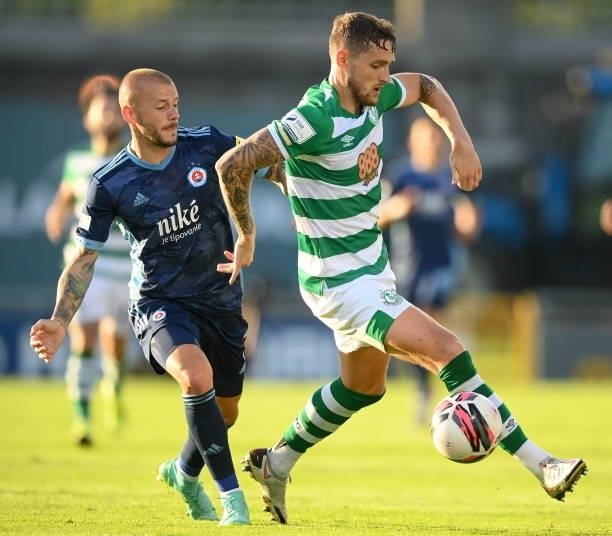 Dublin , Ireland - 13 July 2021; Lee Grace of Shamrock Rovers in action against Vladimír Weiss of Slovan Bratislava during the UEFA Champions League...