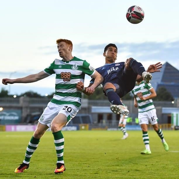 Dublin , Ireland - 13 July 2021; Vernon De Marco of Slovan Bratislava in action against Rory Gaffney of Shamrock Rovers during the UEFA Champions...