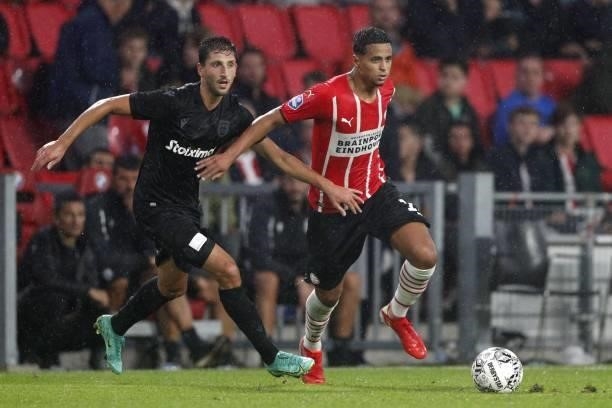 Nika Ninua of Paok FC, Mohamed Ihattaren of PSV Eindhoven during the friendly match between PSV Eindhoven and PAOK FC at Phillips stadium on July 14,...