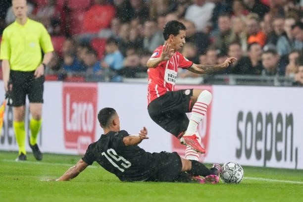 Elefteris Lyratzis of PAOK FC, Mauro Junior of PSV during the Club Friendly match between PSV v PAOK Saloniki at the Philips Stadium on July 14, 2021...