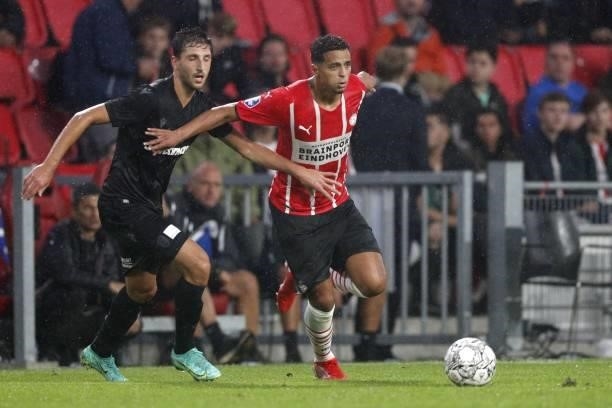 Nika Ninua of Paok FC, Mohamed Ihattaren of PSV Eindhoven during the friendly match between PSV Eindhoven and PAOK FC at Phillips stadium on July 14,...