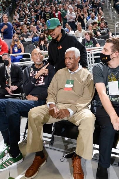 Rapper, Chance the Rapper talks to NBA Legends, Kareem Abdul-Jabbar and Oscar Robertson before the game between the Phoenix Suns and Milwaukee Bucks...