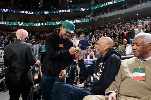 Rapper, Chance the Rapper talks to NBA Legend, Kareem Abdul-Jabbar before the game between the Phoenix Suns and Milwaukee Bucks during Game Four of...