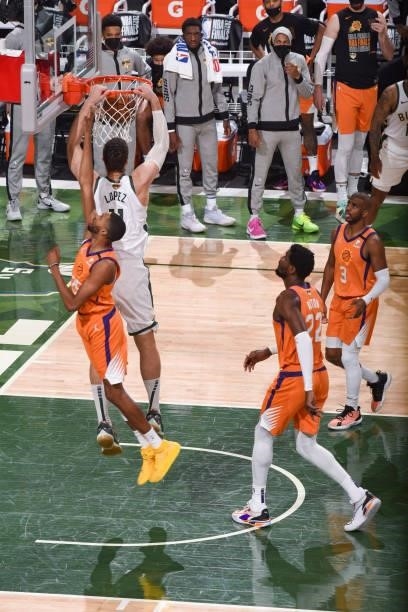 Brook Lopez of the Milwaukee Bucks dunks the ball during the game against the Phoenix Suns during Game Four of the 2021 NBA Finals on July 14, 2021...