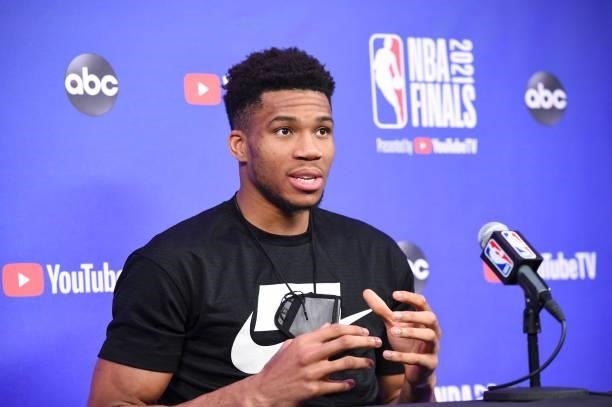 Giannis Antetokounmpo of the Milwaukee Bucks talks to the media after the game against the Phoenix Suns during Game Four of the 2021 NBA Finals on...