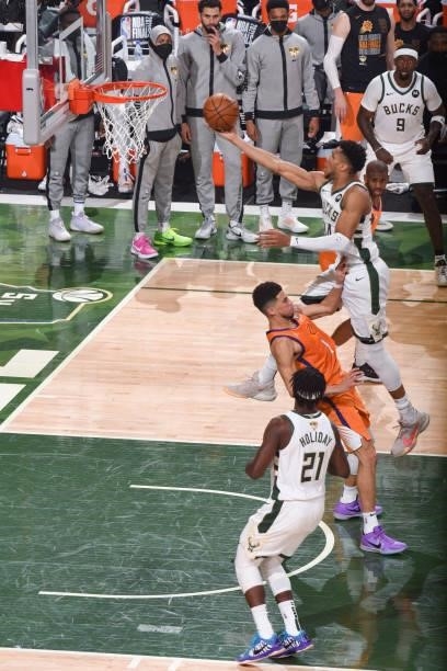 Giannis Antetokounmpo of the Milwaukee Bucks drives to the basket during the game against the Phoenix Suns during Game Four of the 2021 NBA Finals on...