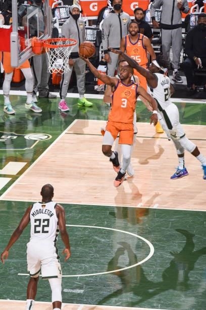 Chris Paul of the Phoenix Suns drives to the basket during the game against the Milwaukee Bucks during Game Four of the 2021 NBA Finals on July 14,...