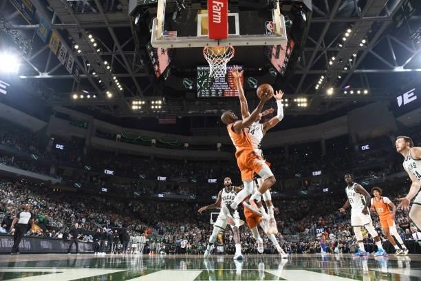 Chris Paul of the Phoenix Suns drives to the basket during the game against the Milwaukee Bucks during Game Four of the 2021 NBA Finals on July 14,...