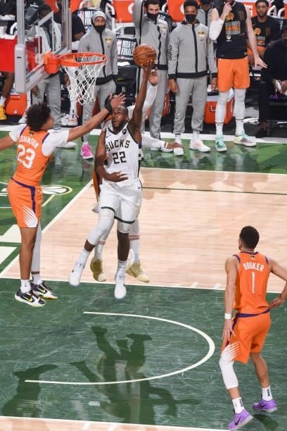 Khris Middleton of the Milwaukee Bucks drives to the basket during the game against the Phoenix Suns during Game Four of the 2021 NBA Finals on July...