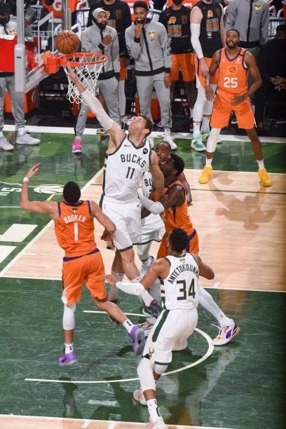 Brook Lopez of the Milwaukee Bucks blocks the ball during the game against the Phoenix Suns during Game Four of the 2021 NBA Finals on July 14, 2021...