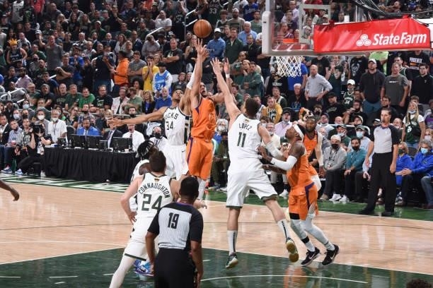 Devin Booker of the Phoenix Suns shoots the ball during the game against the Milwaukee Bucks during Game Four of the 2021 NBA Finals on July 14, 2021...