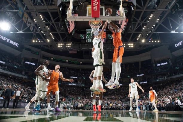 Giannis Antetokounmpo of the Milwaukee Bucks blocks Deandre Ayton of the Phoenix Suns during Game Four of the 2021 NBA Finals on July 14, 2021 at the...