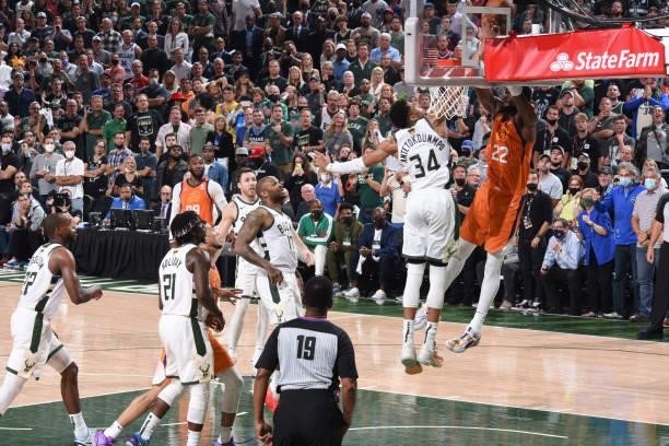 Giannis Antetokounmpo of the Milwaukee Bucks blocks Deandre Ayton of the Phoenix Suns during Game Four of the 2021 NBA Finals on July 14, 2021 at the...