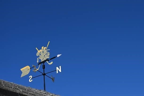 The club weather vane is seen against a blue sky on day one of The 149th British Open Golf Championship at Royal St George's, Sandwich in south-east...