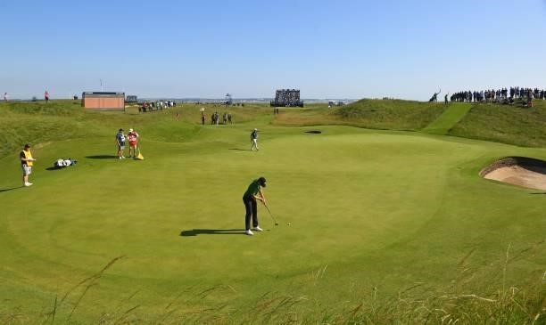 Belgium's Thomas Detry putts on the 6th green during his first round on day one of The 149th British Open Golf Championship at Royal St George's,...