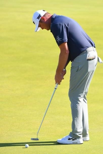 Golfer Jason Kokrak putts on the 6th green during his first round on day one of The 149th British Open Golf Championship at Royal St George's,...