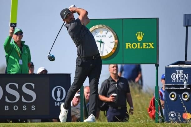 Golfer Brooks Koepka watches his drive from the 7th tee during his first round on day one of The 149th British Open Golf Championship at Royal St...